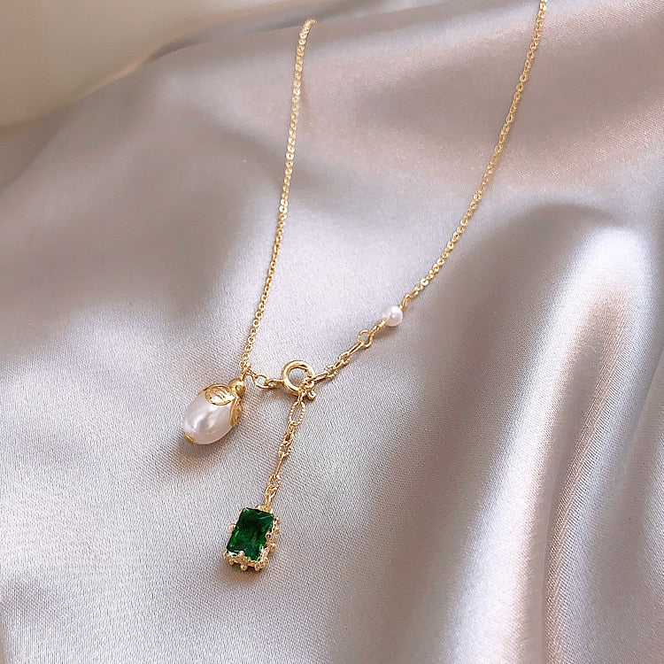 Gold, Emerald, and Pearl Necklace