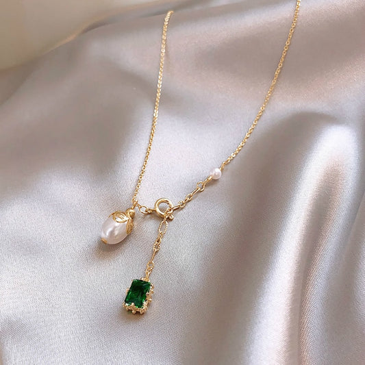 Gold, Emerald, and Pearl Necklace